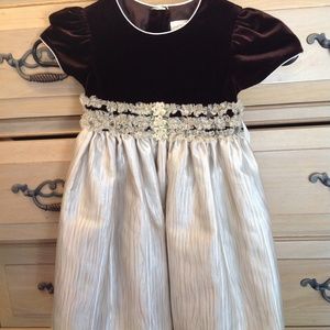 Little girl's brown and cream velvet dress